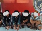 tersangka keroyok