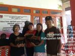 foto hukum Tua desa pangu Satu saat kegiatan pasar murah